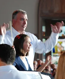 Picture of Robert Laguna conducting ACWE