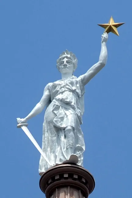 Photo of the Goddess of Liberty statue atop the State of Texas Capitol Building